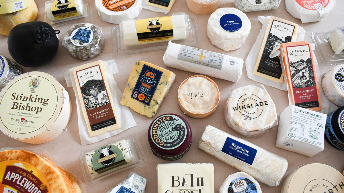 English farmhouse cheeses laid out to choose from for a build your own cheeseboard