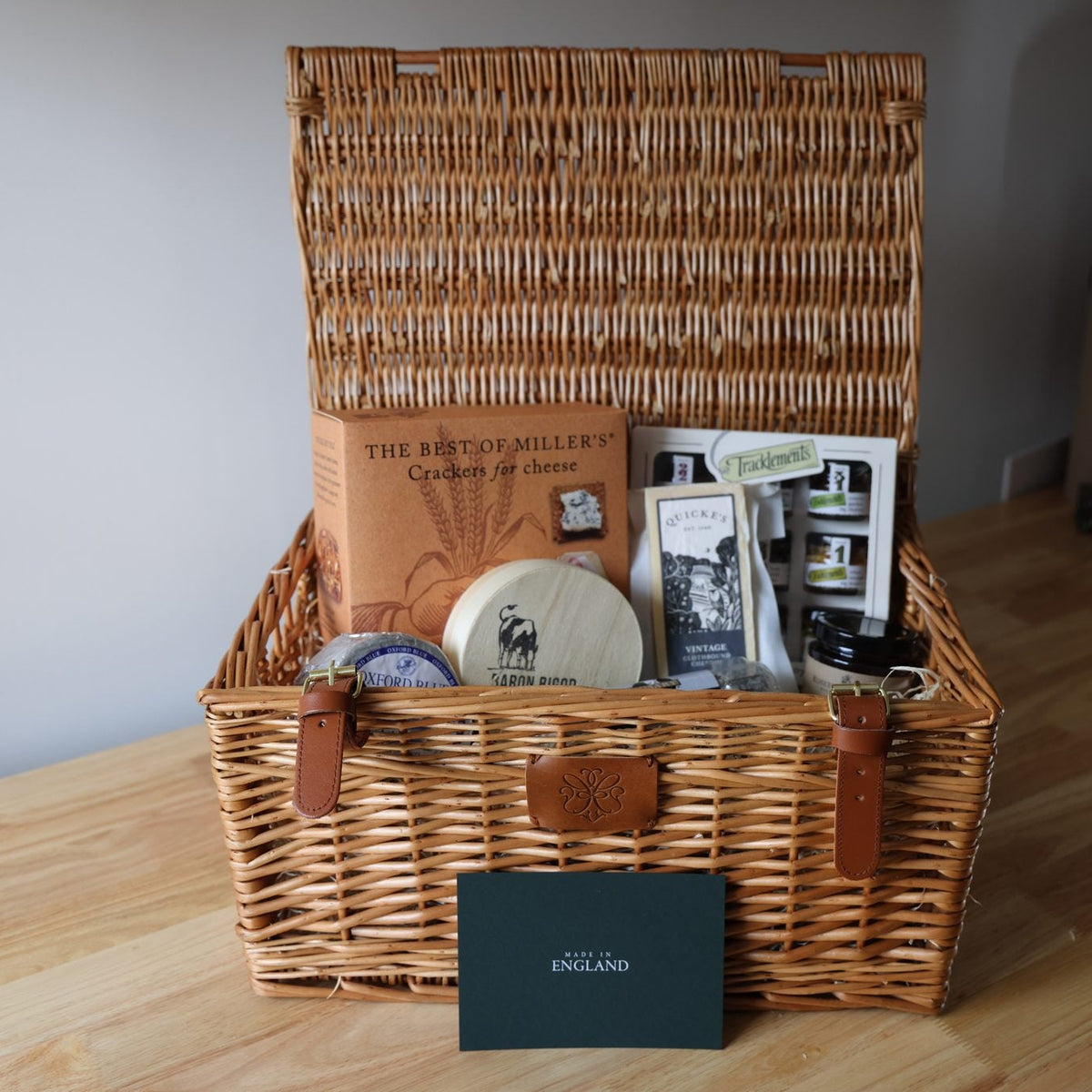 Cheese hamper gift in an 18 inch wicker basket with a Made in England gift card