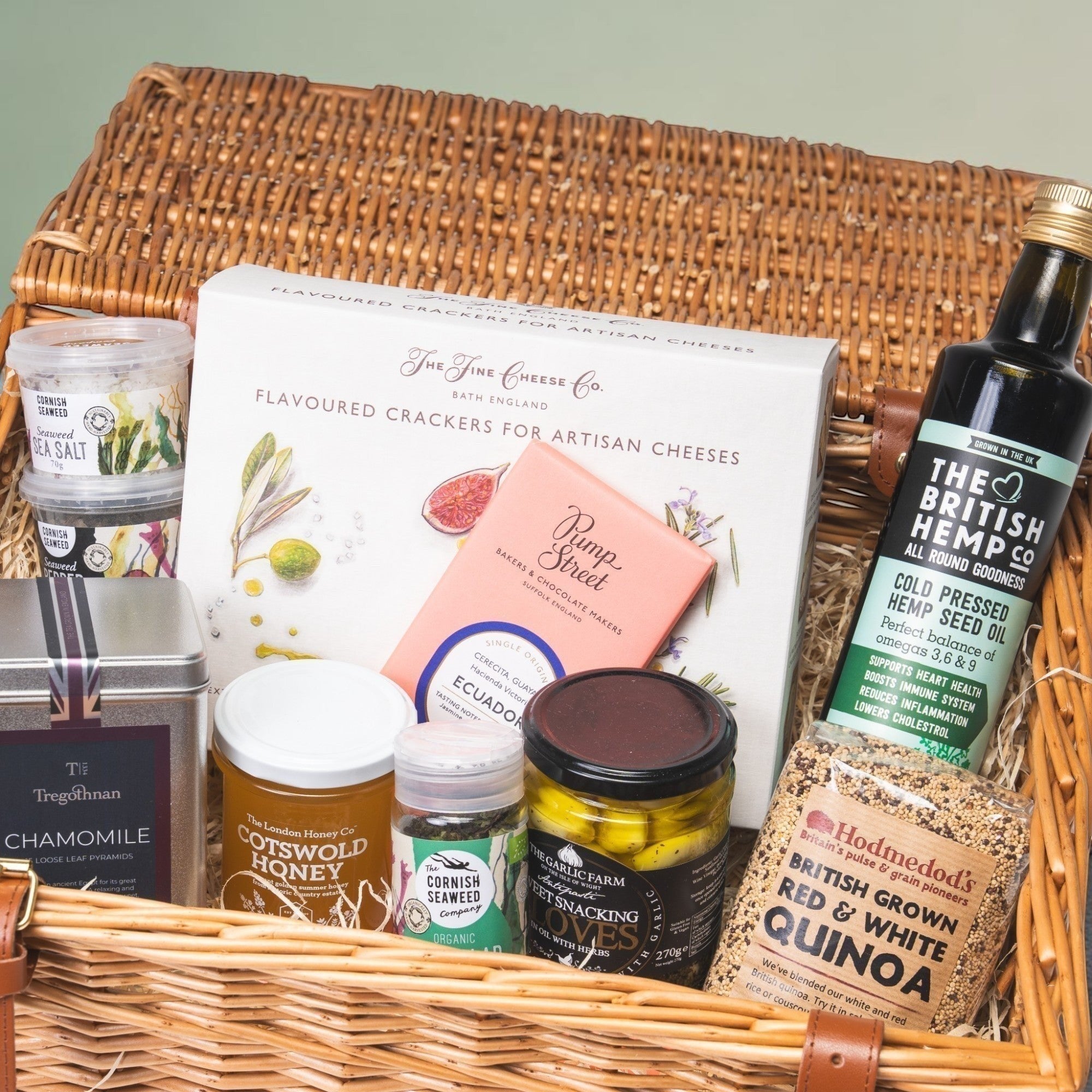 Made In England artisan cheese flavoured cracker gift basket with hemp seed oil, quinoa, honey, chocolate, and seaweed salt.
