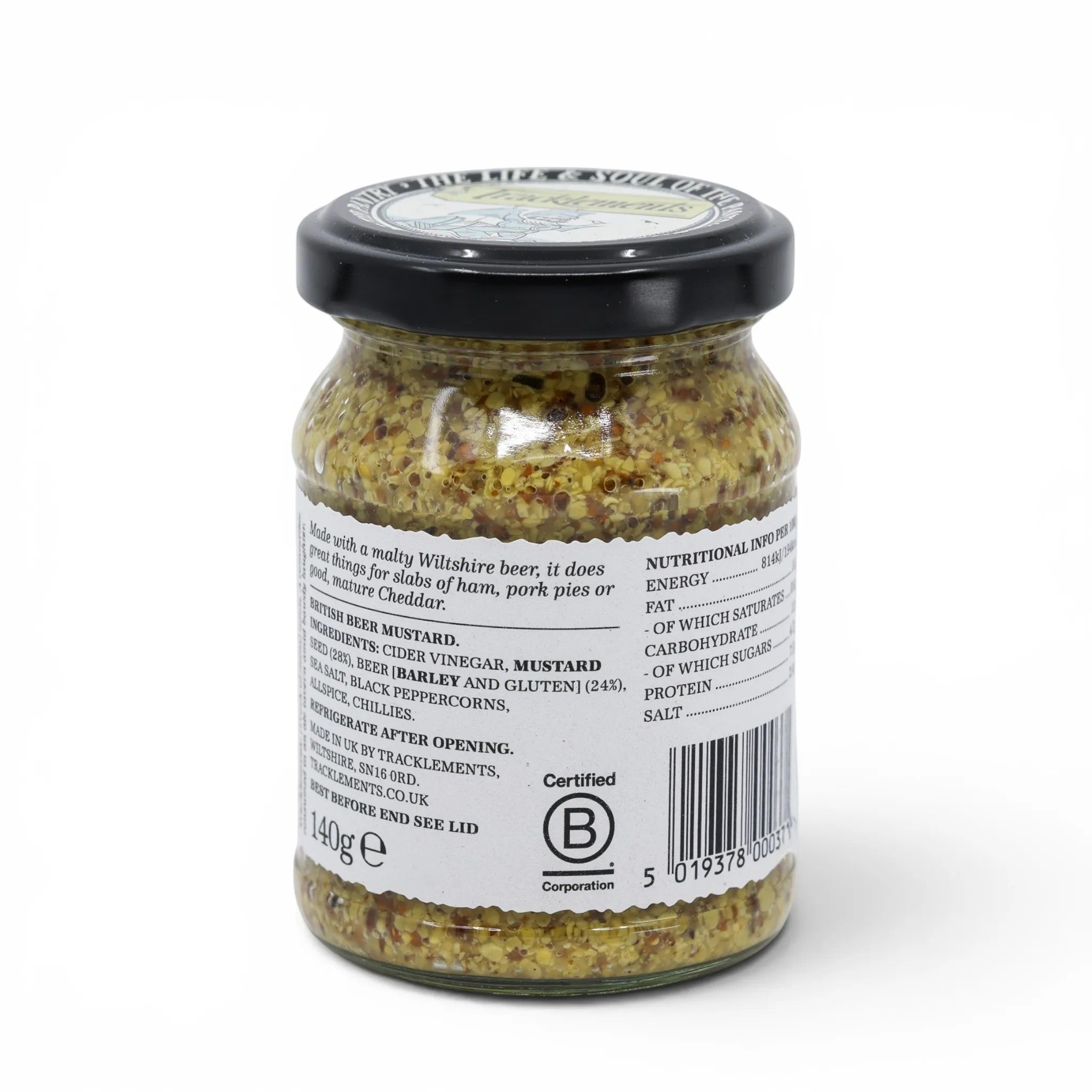 Made In England Tracklements British Beer Mustard in a glass jar with a black lid. Coarse-grain mustard with visible seeds and ale.