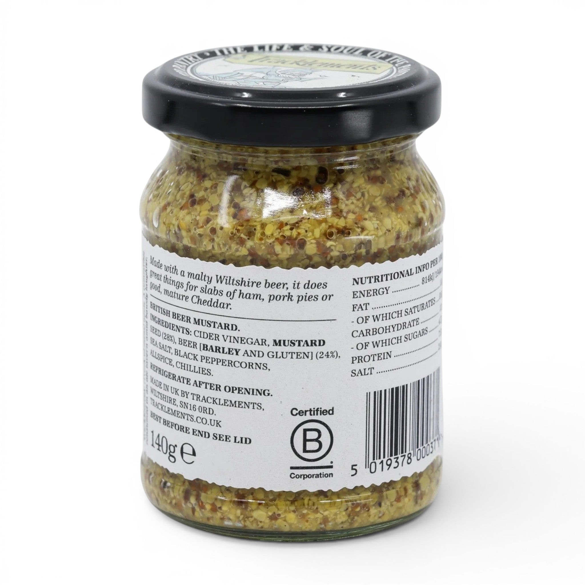 Made In England Tracklements British Beer Mustard in a glass jar with a black lid. Coarse-grain mustard with visible seeds and ale.