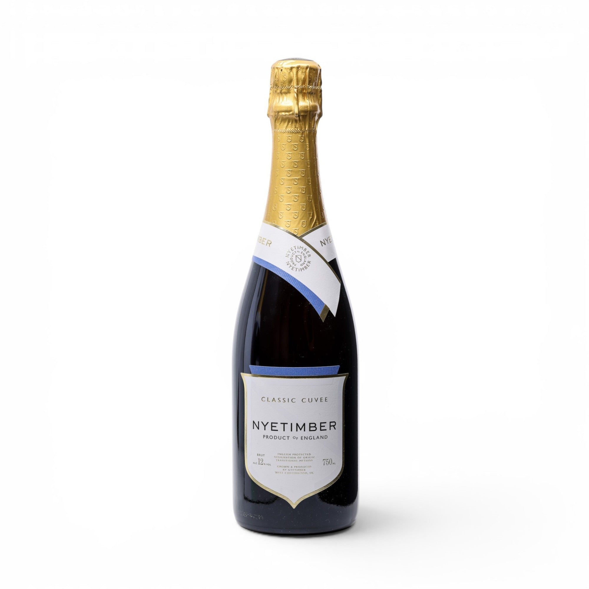 Made In England Nyetimber Classic Cuvee sparkling wine bottle with gold foil top and blue and white label.