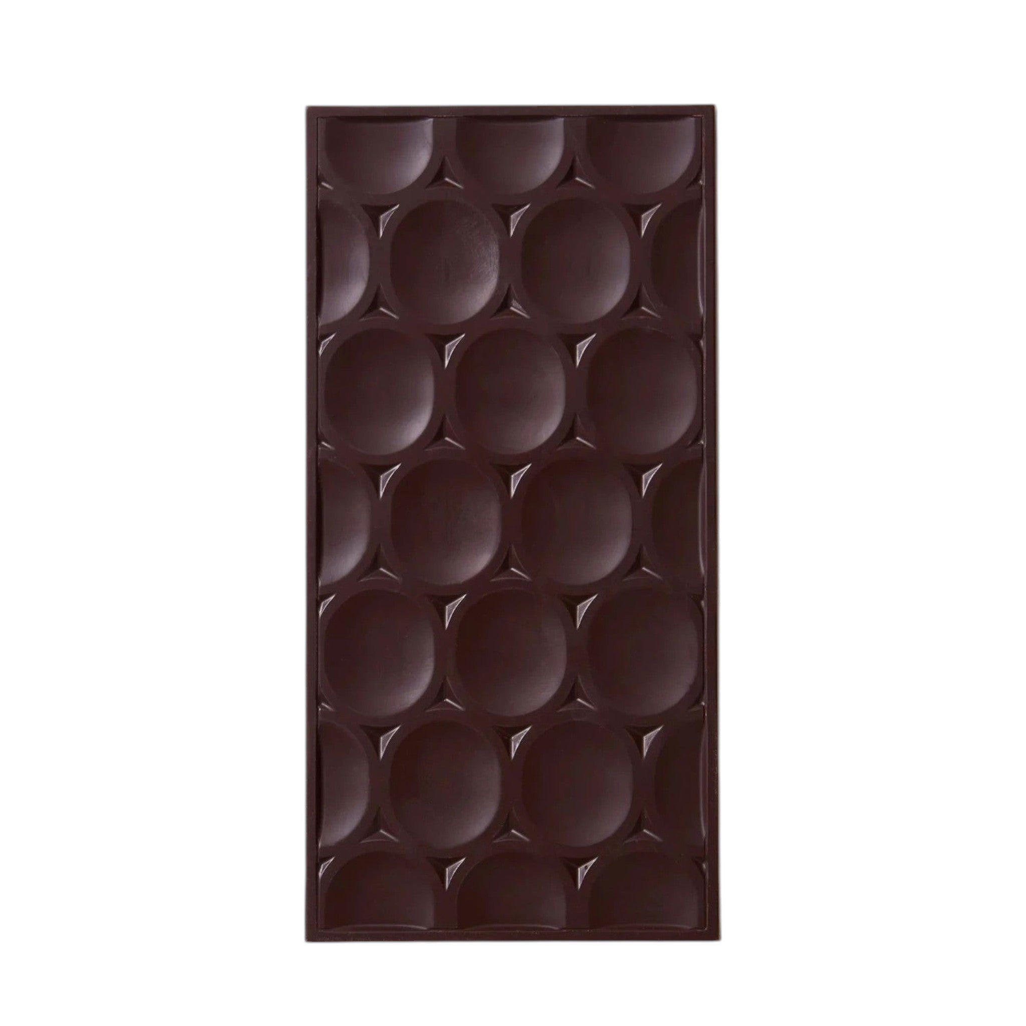 Made In England Pump Street Dark Milk Chocolate Cookie Chip 60% bar with circular indentations and cookie pieces.