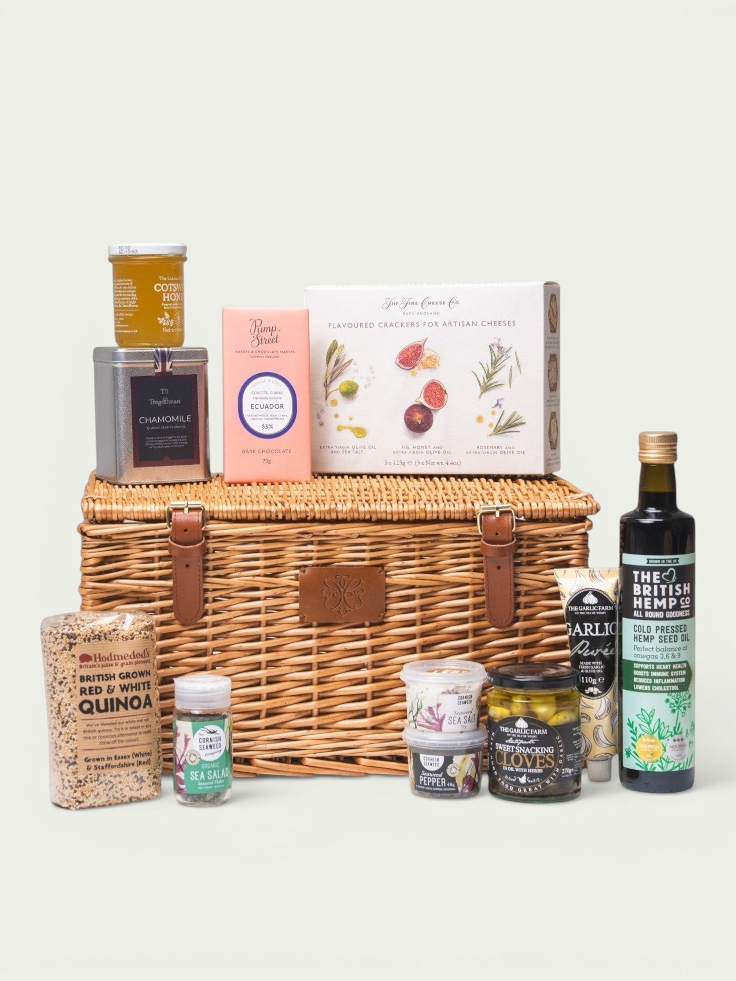 Made In England artisan cheese cracker gift basket with honey, dark chocolate, quinoa, hemp seed oil, and seasonings.