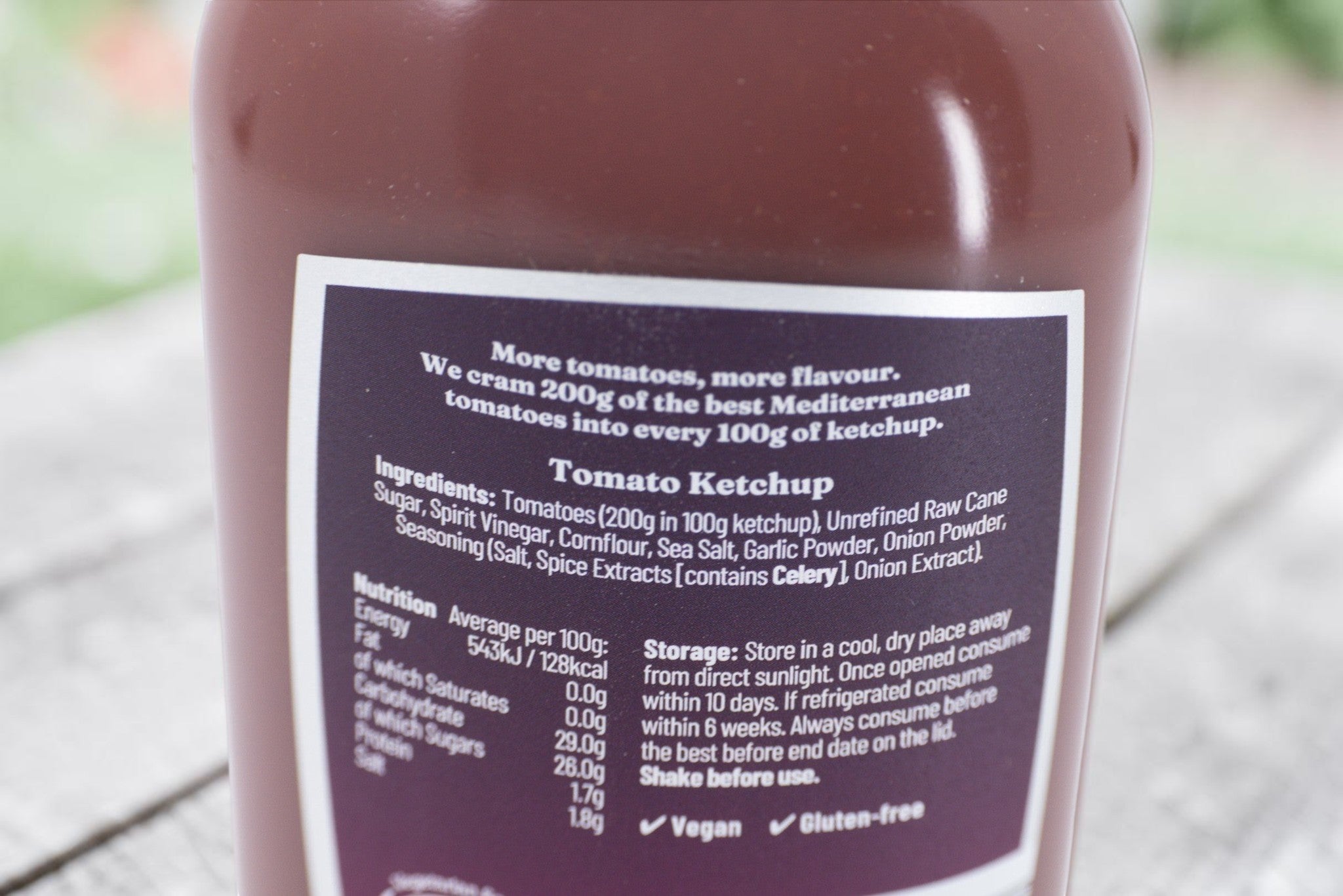 Made In England Stokes Tomato Ketchup bottle label showing ingredients, nutrition facts, and vegan certification.