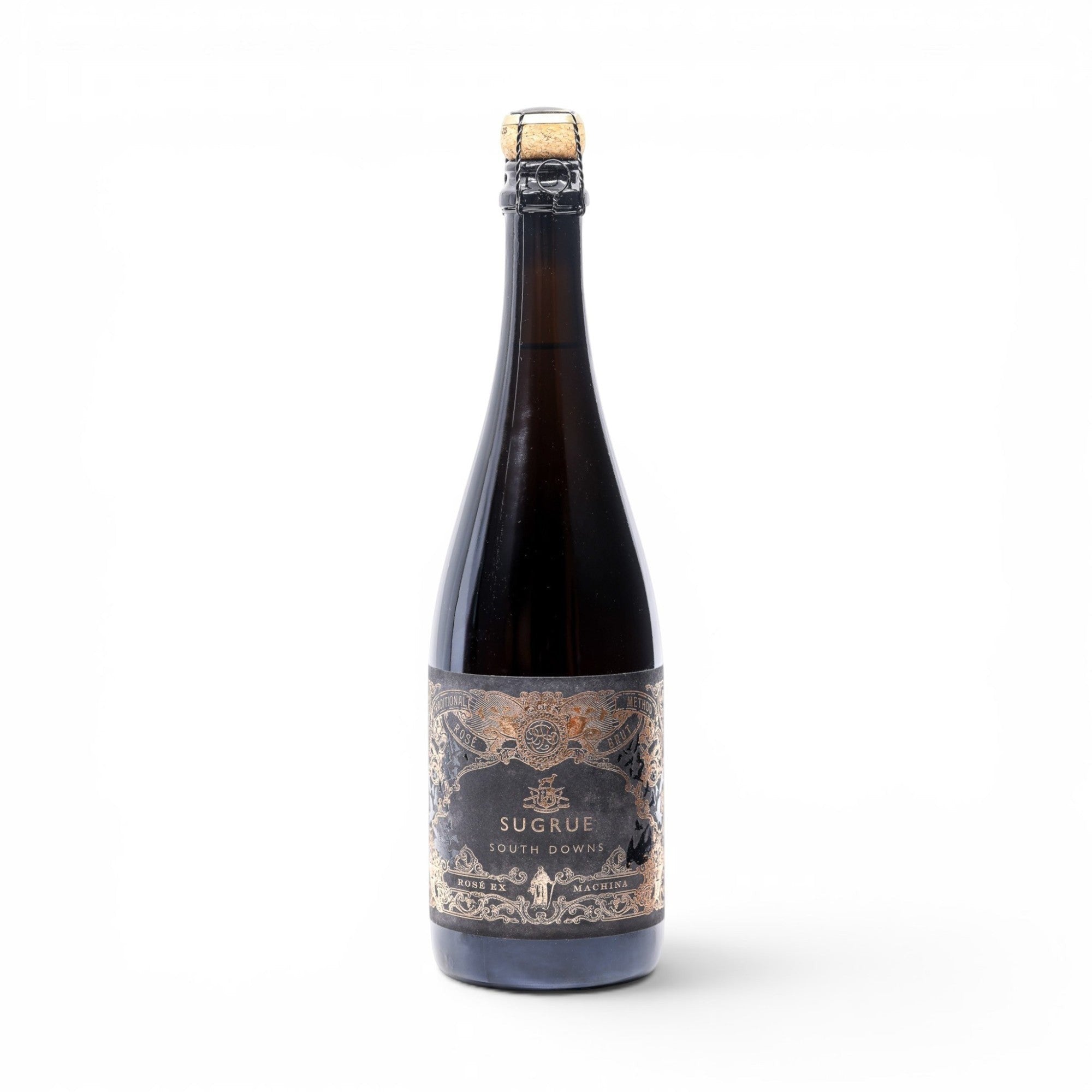 Made In England Sugrue South Downs Cuvée Machina sparkling wine bottle. Blend of Pinot Noir and Chardonnay with notes of red apple, citrus, and brioche.