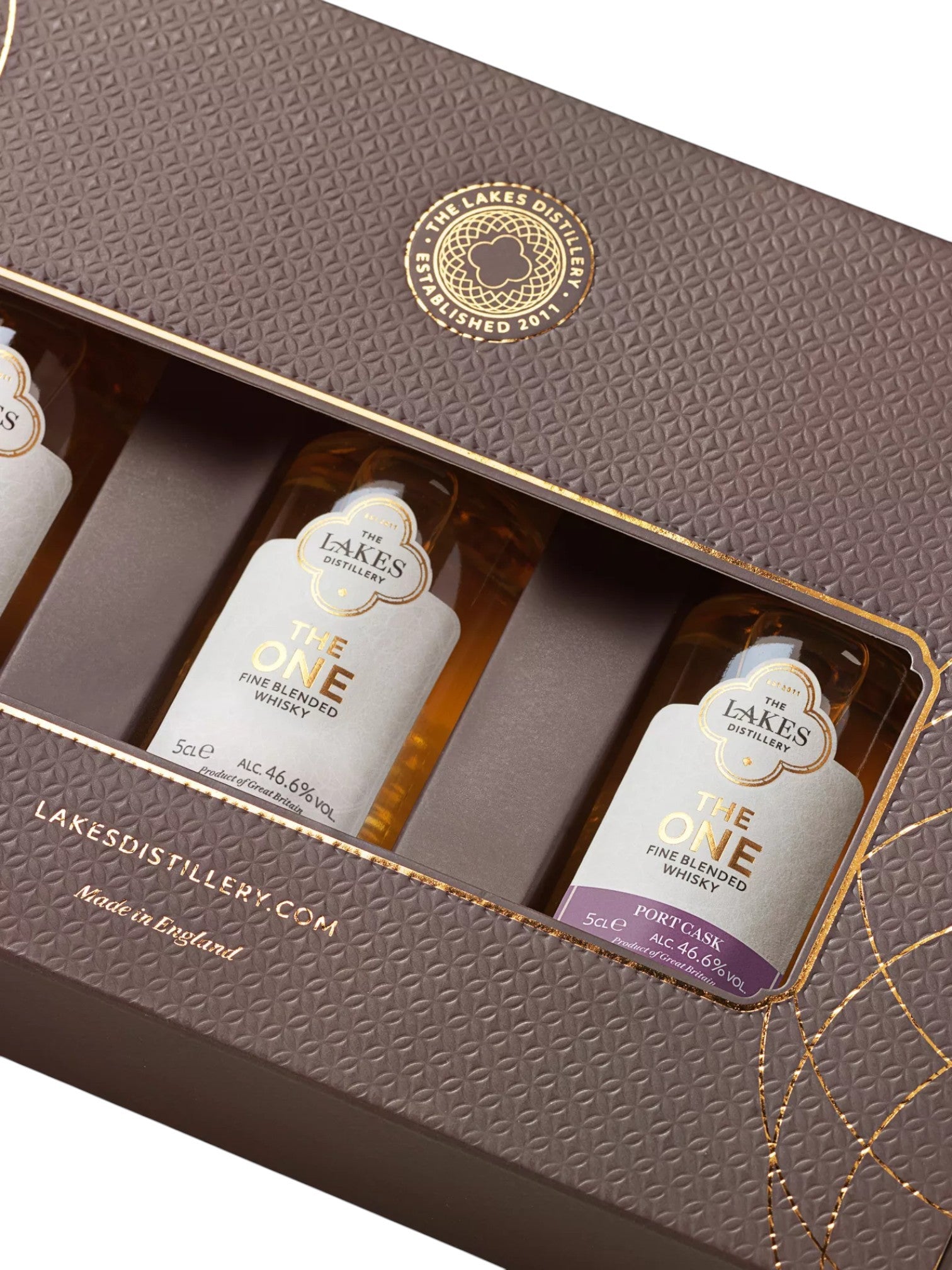Made In England The ONE Blended Whisky Miniature Collection gift box with three 5cl bottles. Embossed brown box with gold foil accents.