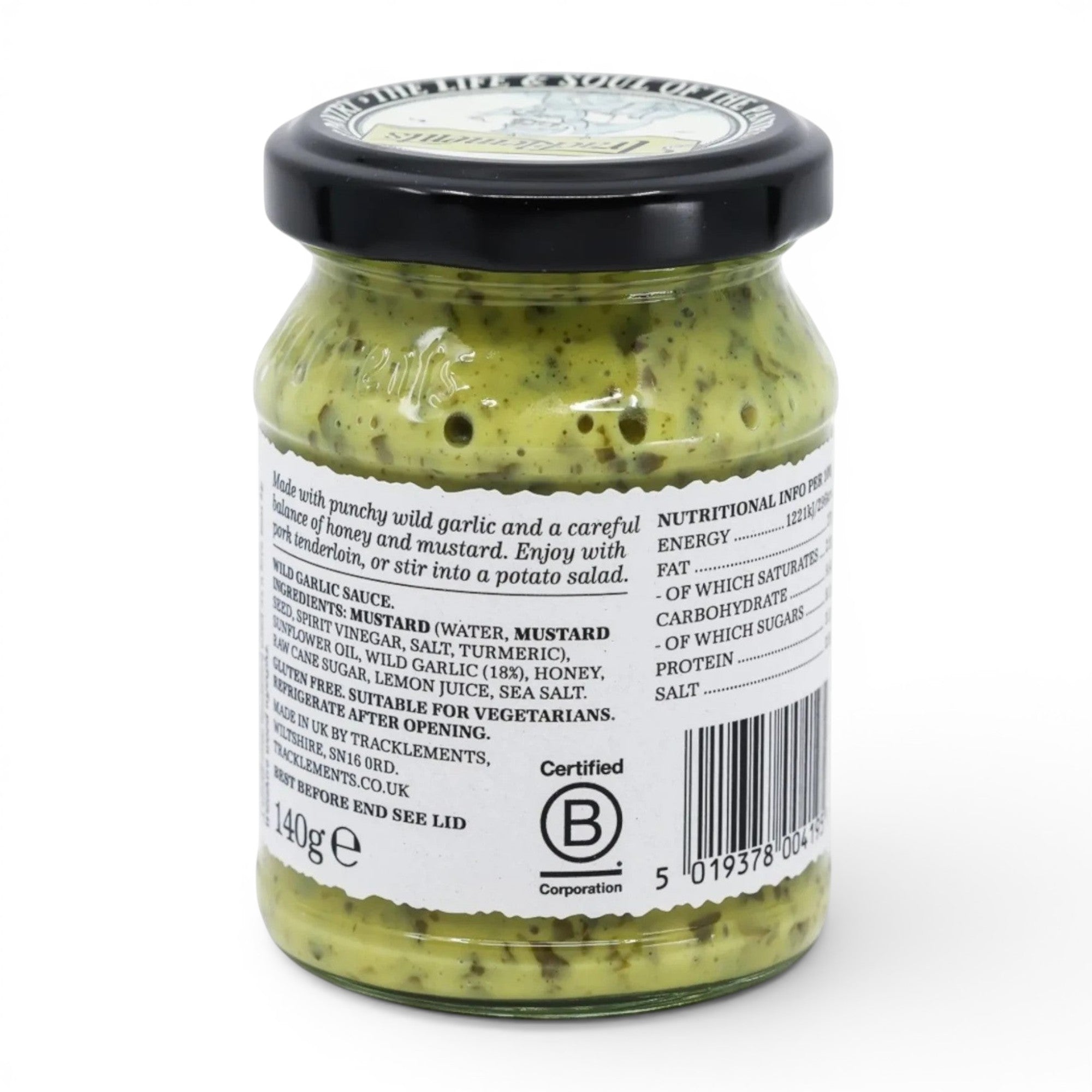 Made In England Wild Garlic Sauce in a glass jar with a black lid. The sauce is green with visible herbs and has a smooth texture.