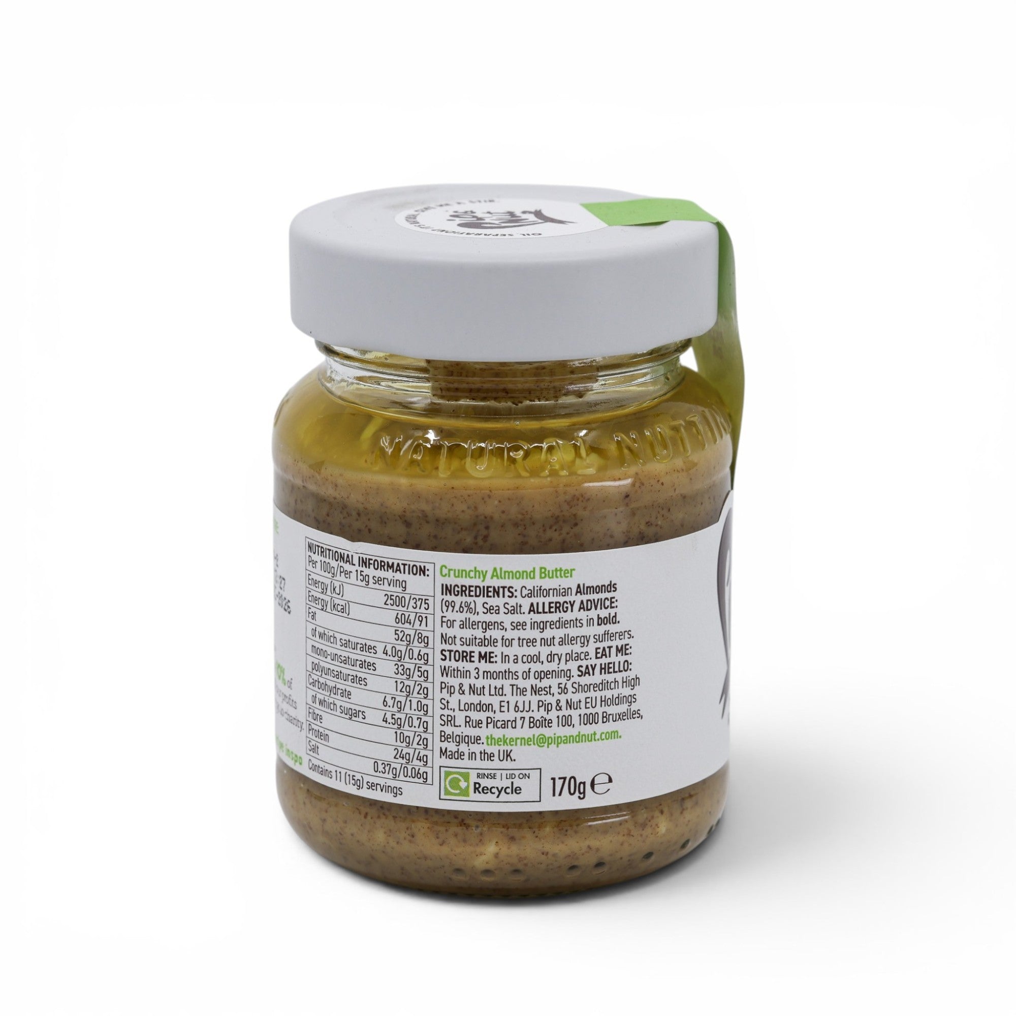 Made In England Crunchy Almond Butter in a glass jar with white lid and green tag. Contains 99.8% Californian almonds and sea salt.