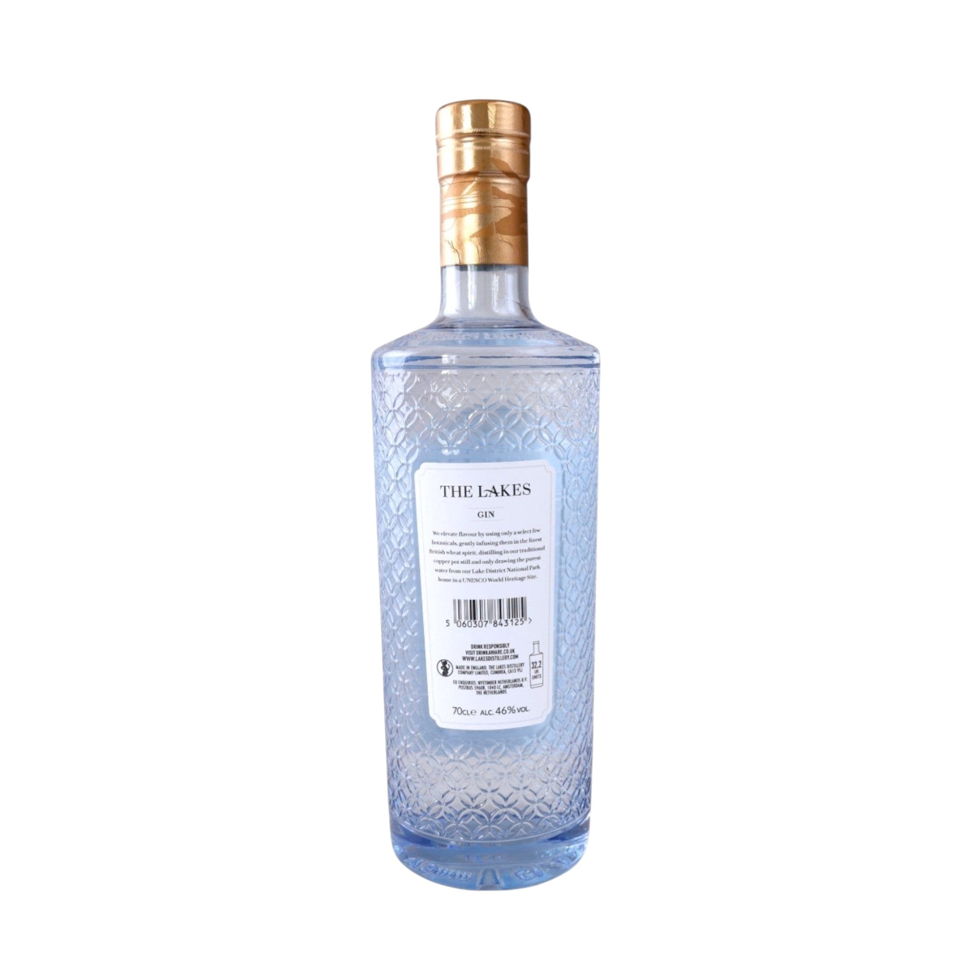 Made In England The Lakes Gin bottle with textured blue glass and gold cap. Notes of juniper and pepper.