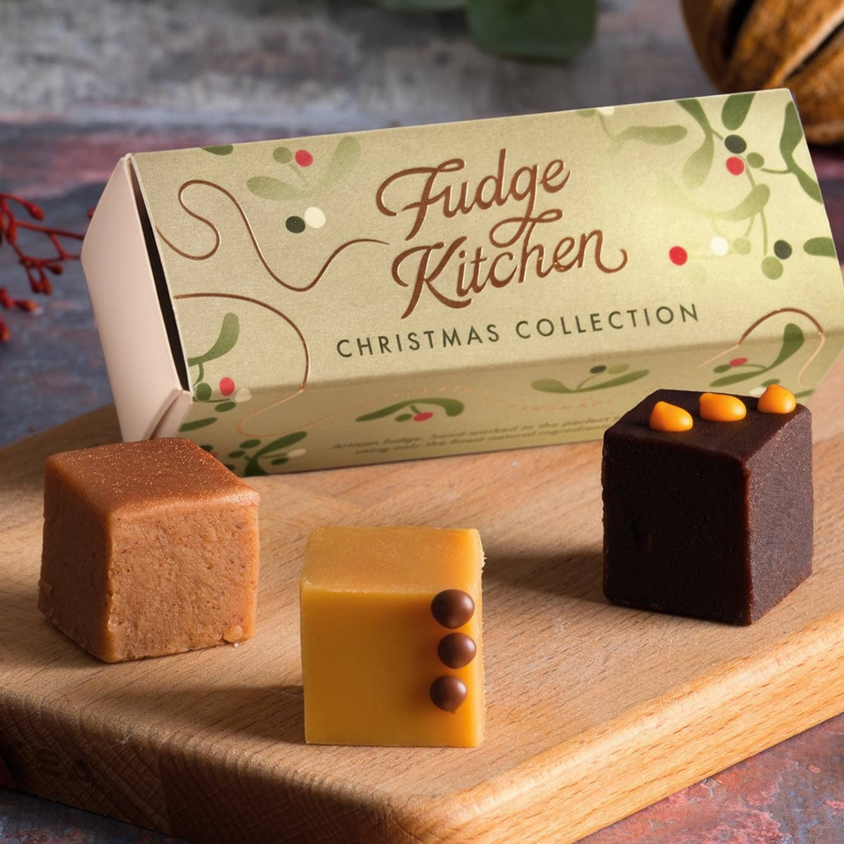 Fudge Kitchen Christmas Fudge Slider in its green printed box with the sliding tray part open.