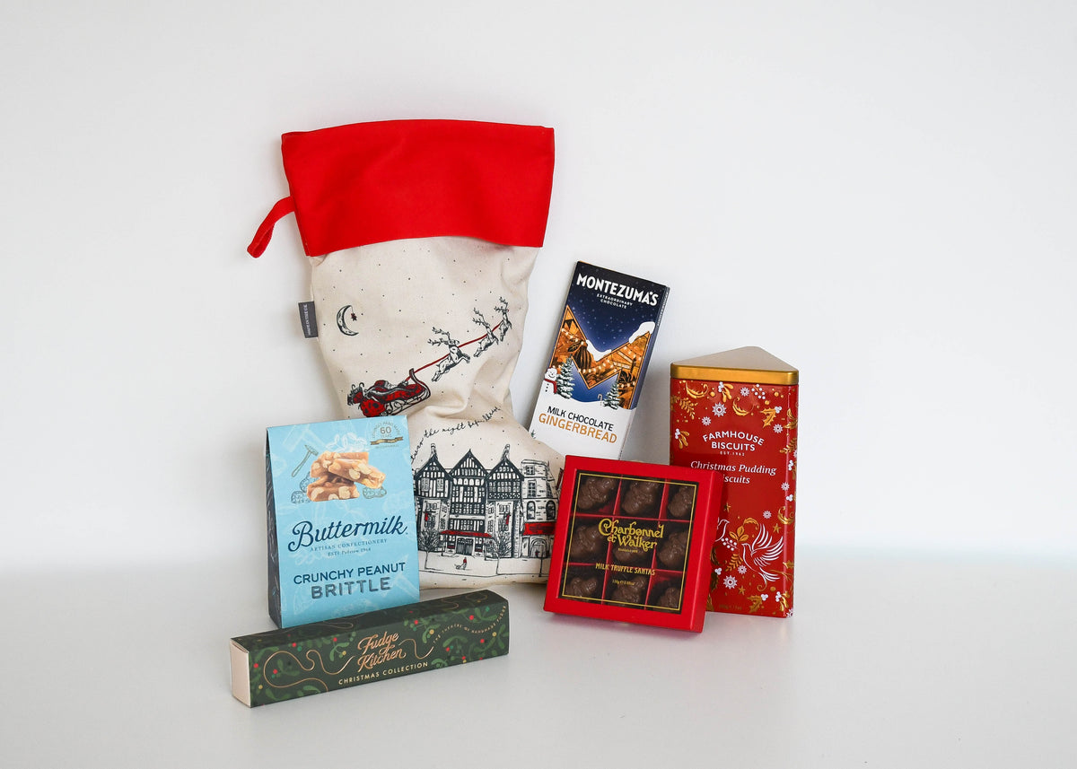 The Night Before Christmas Stocking and its contents on a white background