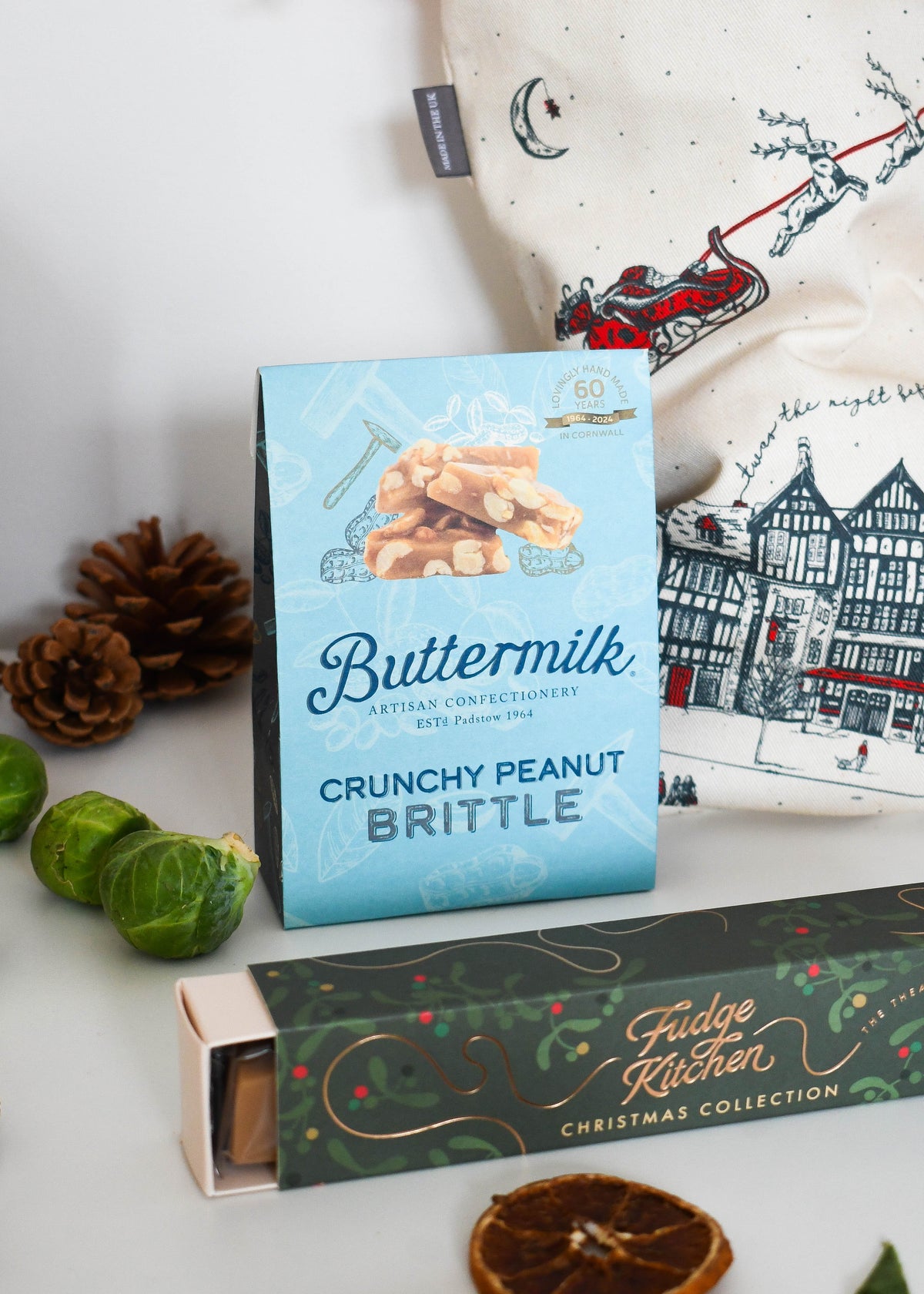 Buttermilk Crunchy Peanut Brittle and Fudge Kitchen Christmas Fudge Slider in front of the Victoria Eggs stocking