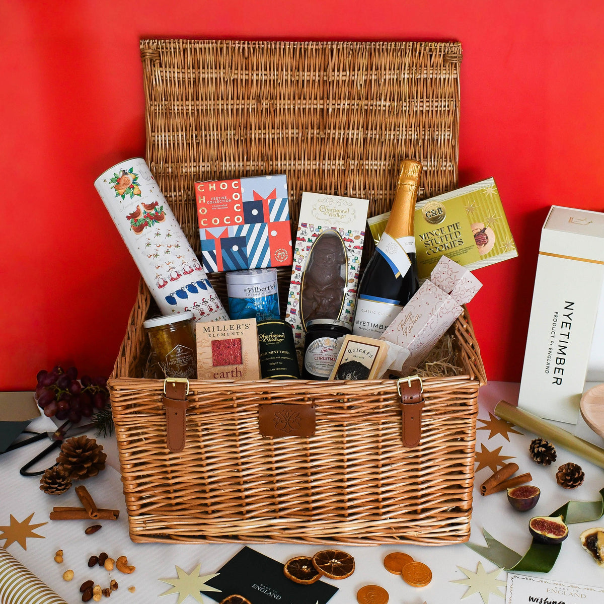 A Very English Christmas Hamper against a red background