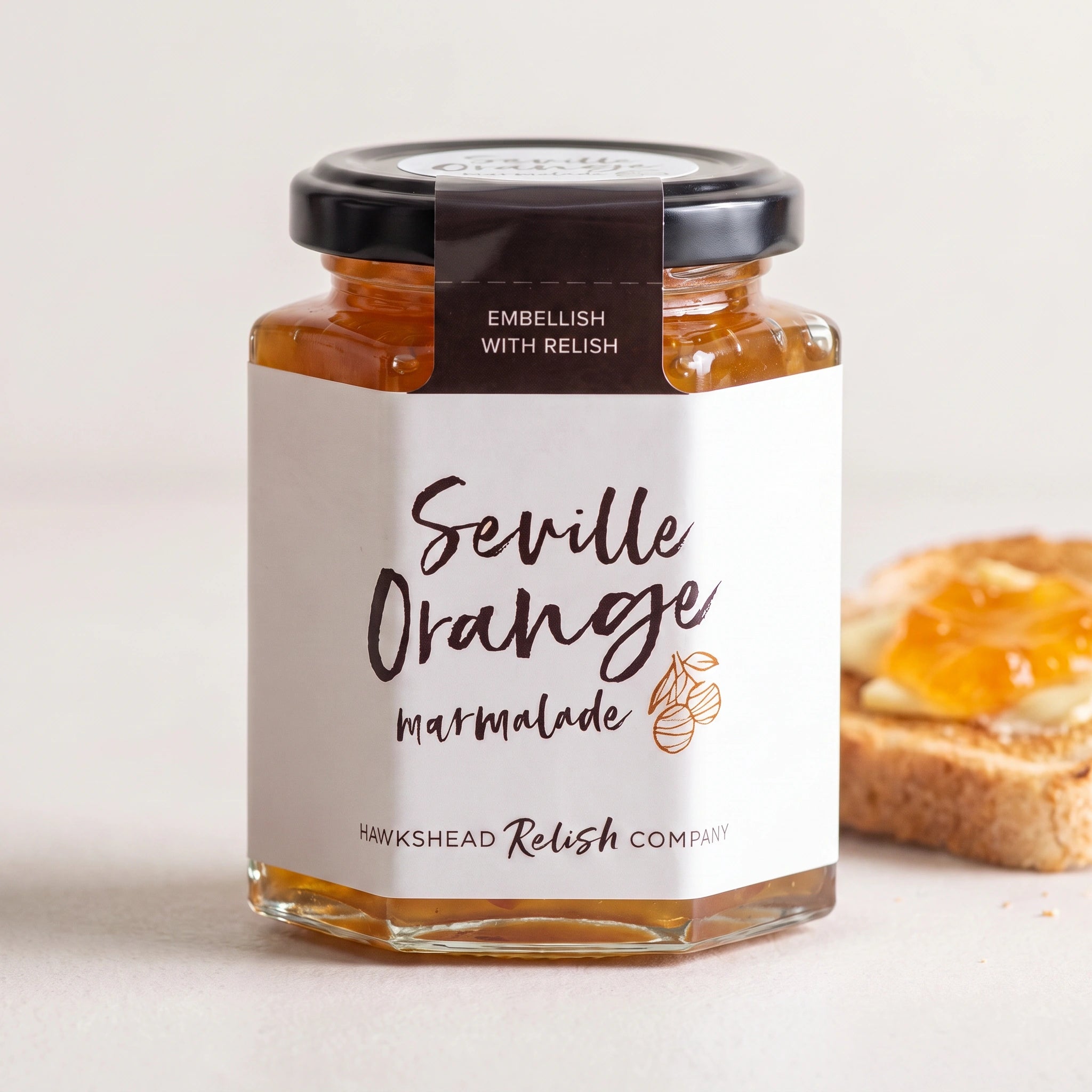Hawkshead Seville Orange Marmalade jar with buttered toast