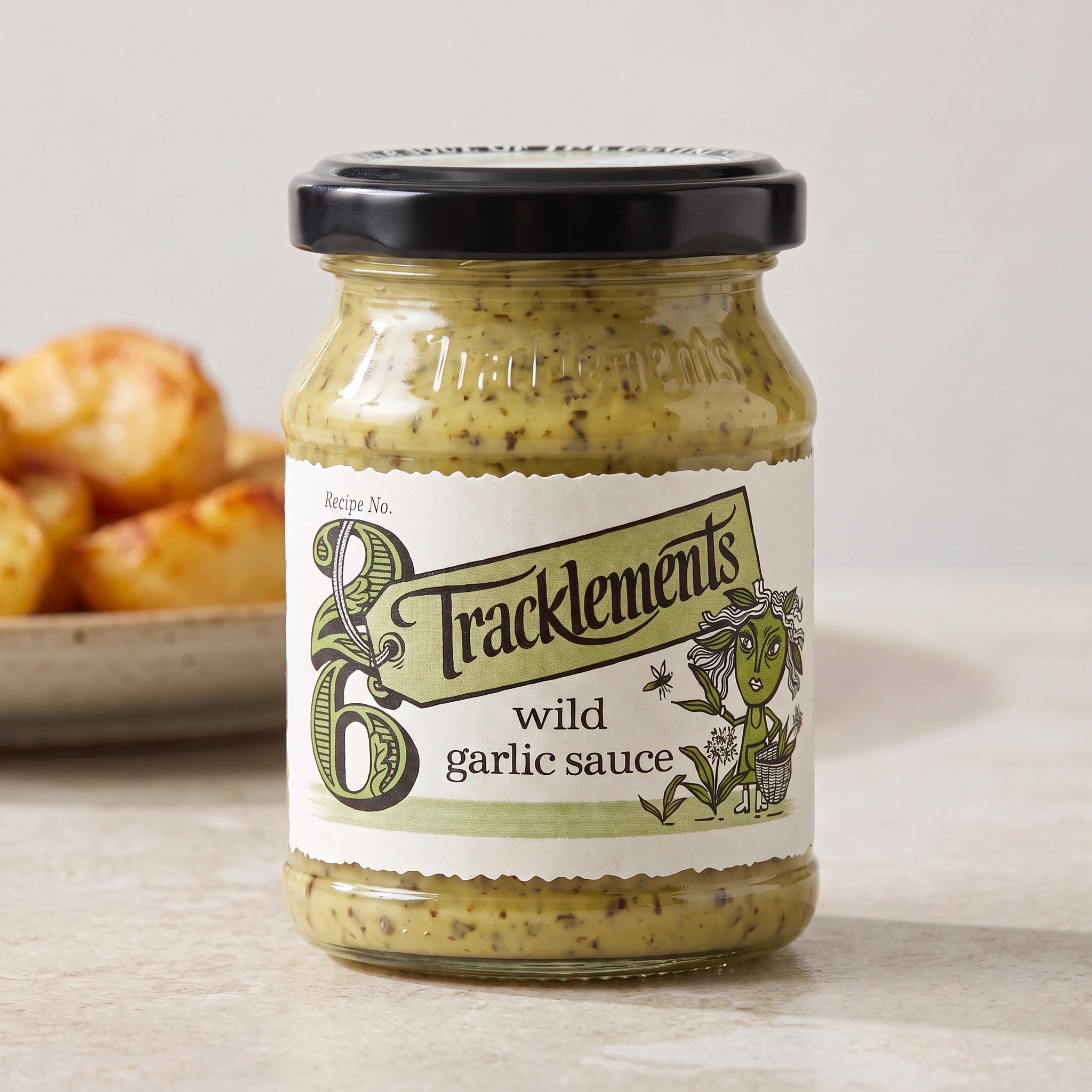 Tracklements Wild Garlic Sauce jar with roast potatoes