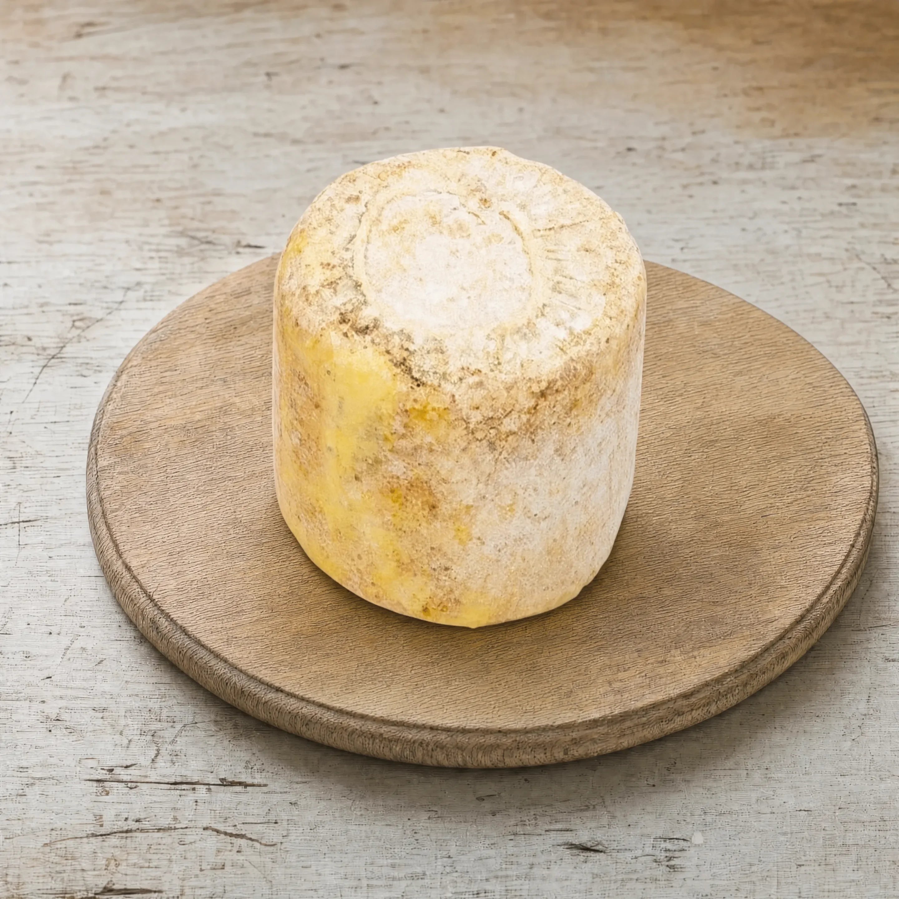 Mrs Kirkham's Lancashire truckle on an oak board