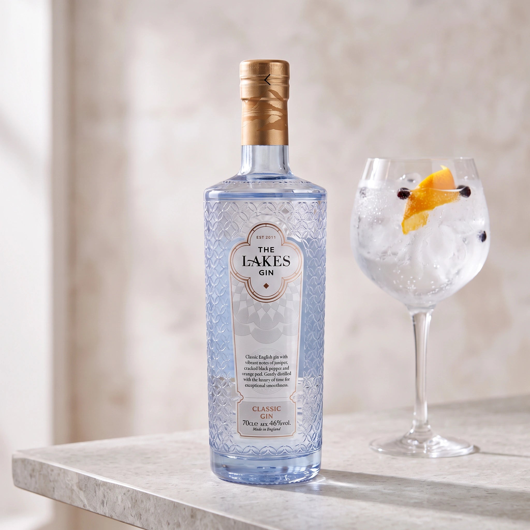 The Lakes Gin Classic bottle with a gin and tonic serve