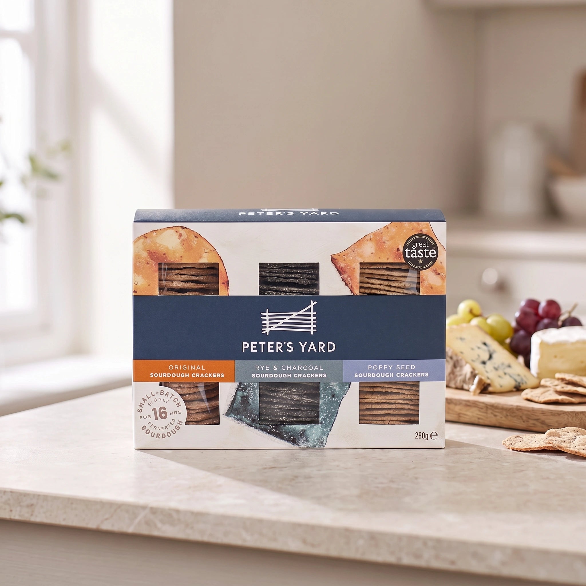 Peter's Yard Sourdough Crackers Selection Box with a cheeseboard