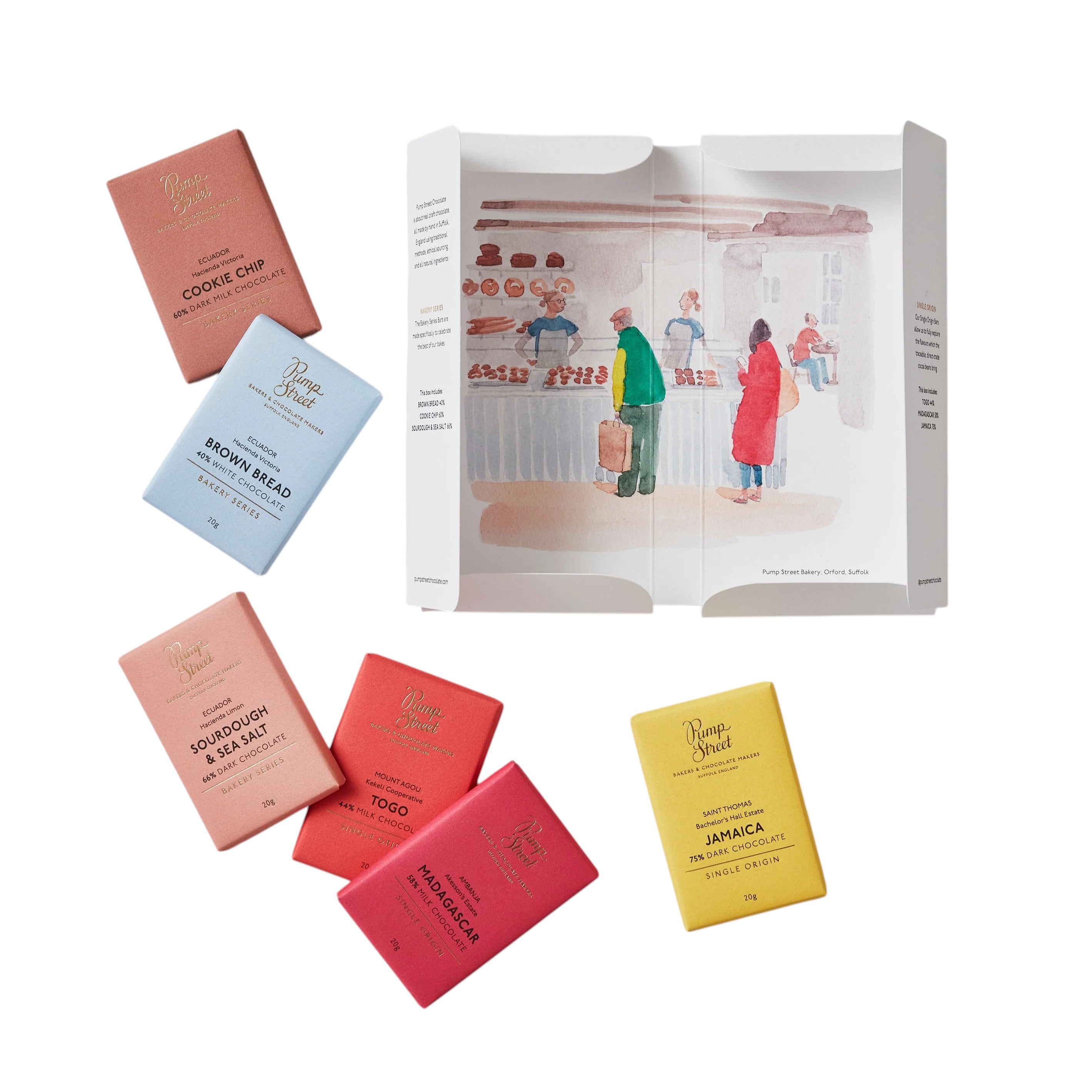Made In England artisan chocolate tasting box with six mini bars: brown bread white chocolate, cookie chip milk chocolate, sourdough & sea salt dark chocolate, togo milk chocolate, madagascar milk chocolate, and jamaica dark chocolate.