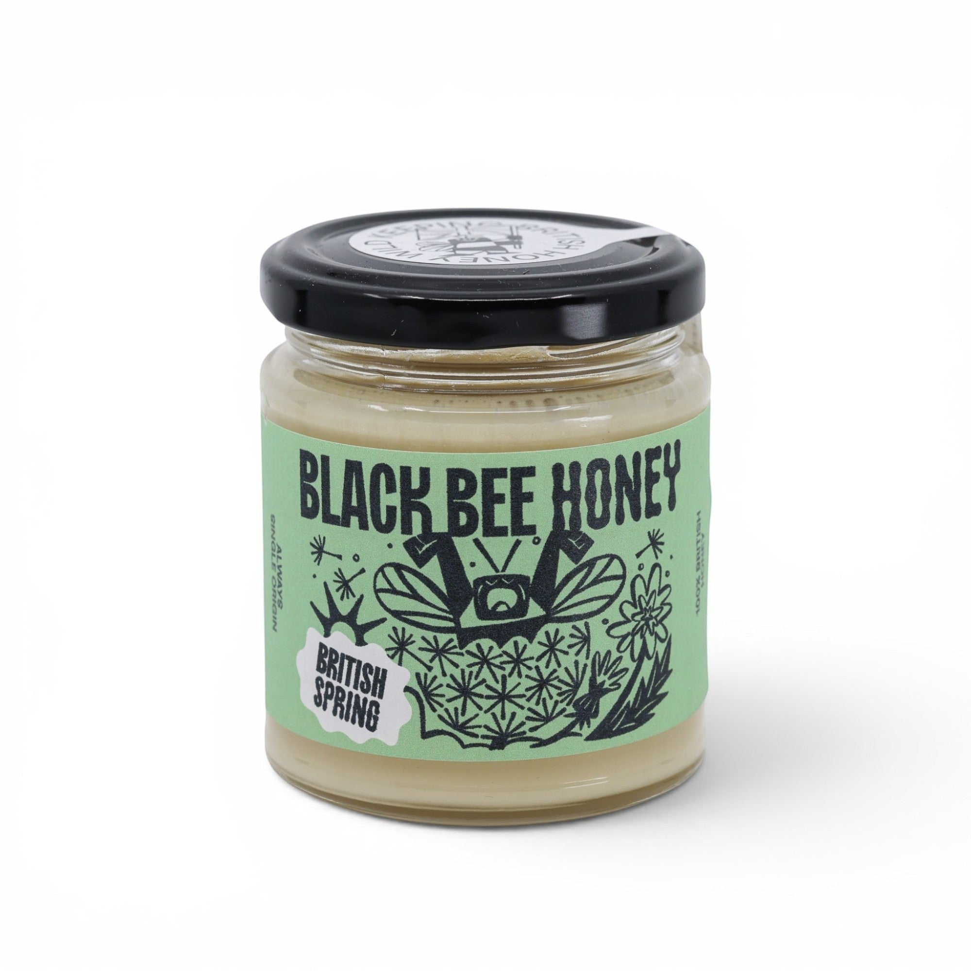 Made In England Black Bee Honey, soft-set British Spring honey in a glass jar with a black lid and a green illustrated label.