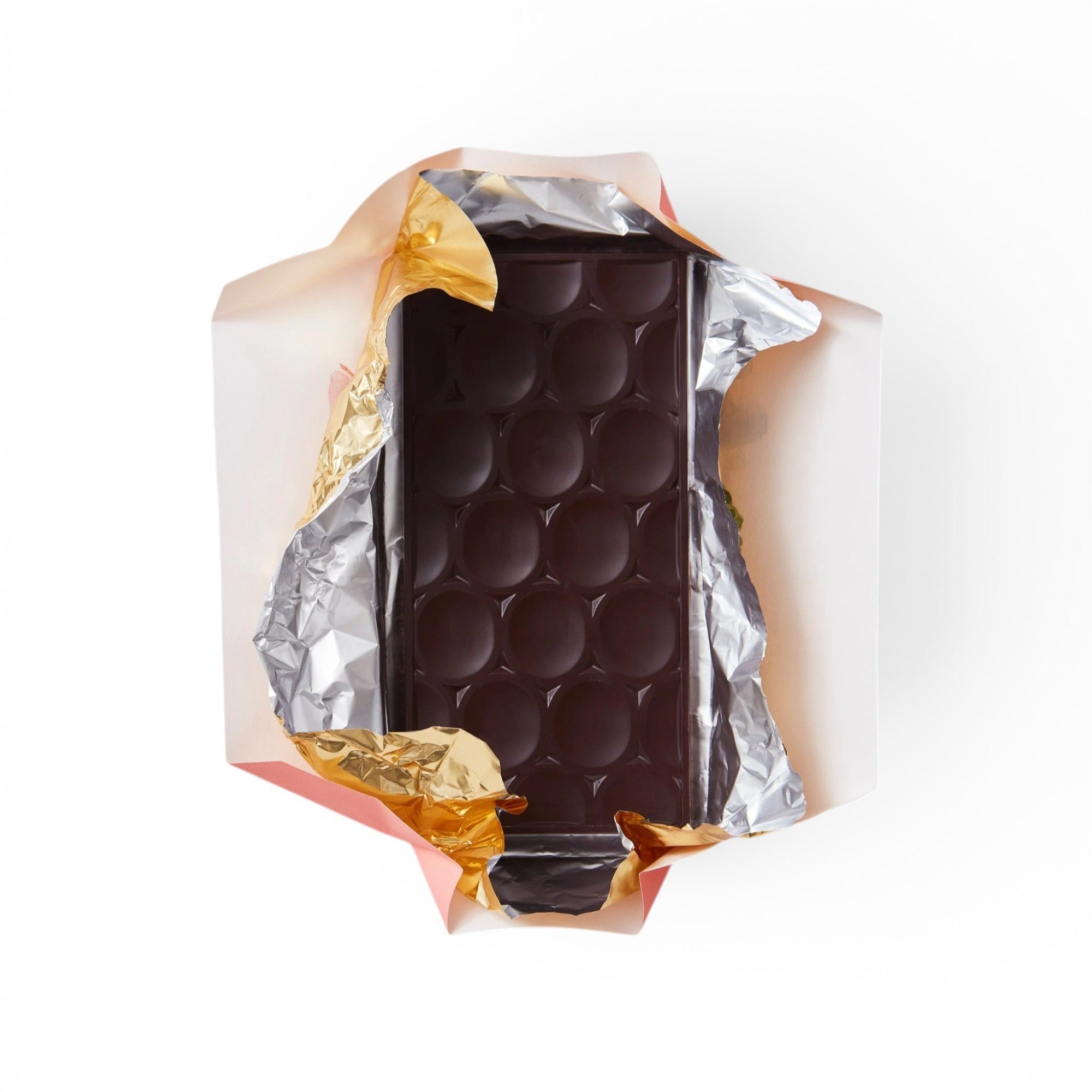 Made In England 75% Dark Chocolate Single Origin Jamaica Bar with 24 round segments, unwrapped in gold foil.