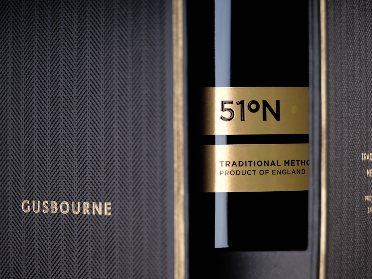 Made In England Gusbourne 51°N sparkling wine in a premium black textured gift box with elegant gold lettering.