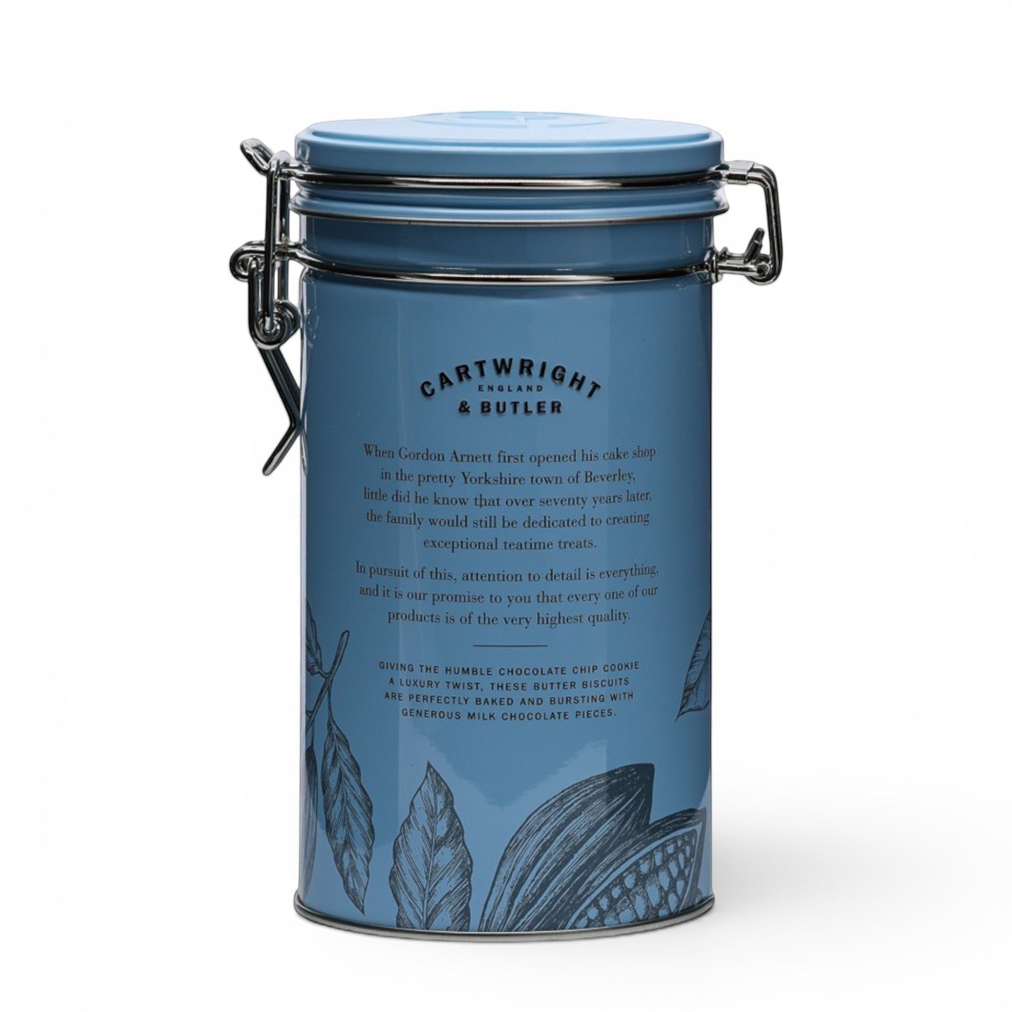 Made In England blue tin of Cartwright & Butler milk chocolate chunk biscuits, featuring text and botanical illustrations.