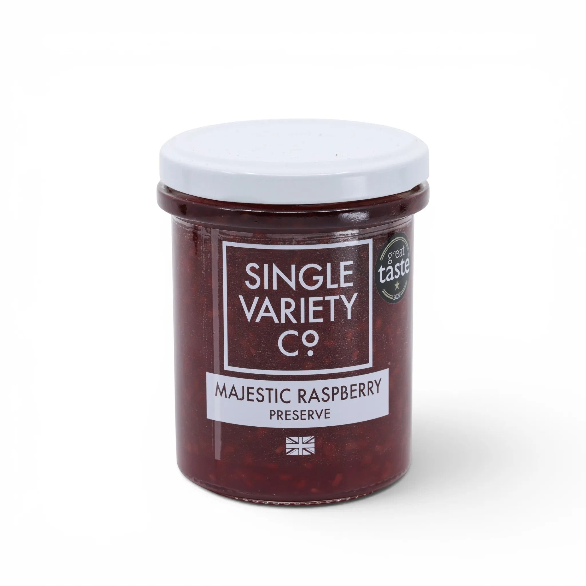 Made In England Single Variety Co. Majestic Raspberry Preserve in a glass jar with a white lid. Contains whole raspberries and has a Great Taste award sticker.