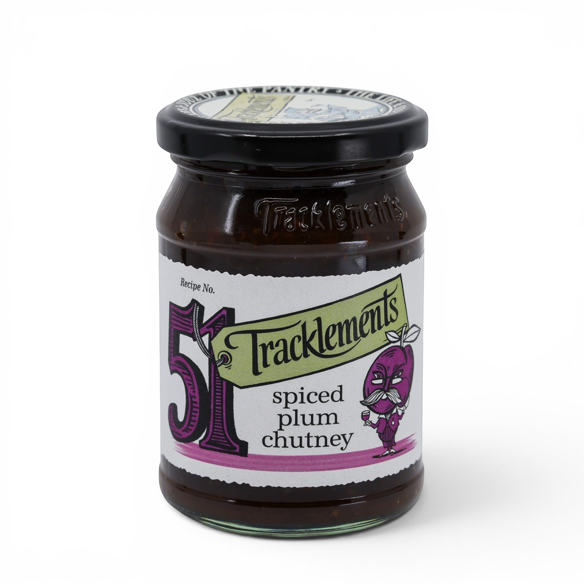 Made In England Tracklements Spiced Plum Chutney in a glass jar with a black lid. Features a cartoon plum character and recipe number 51.