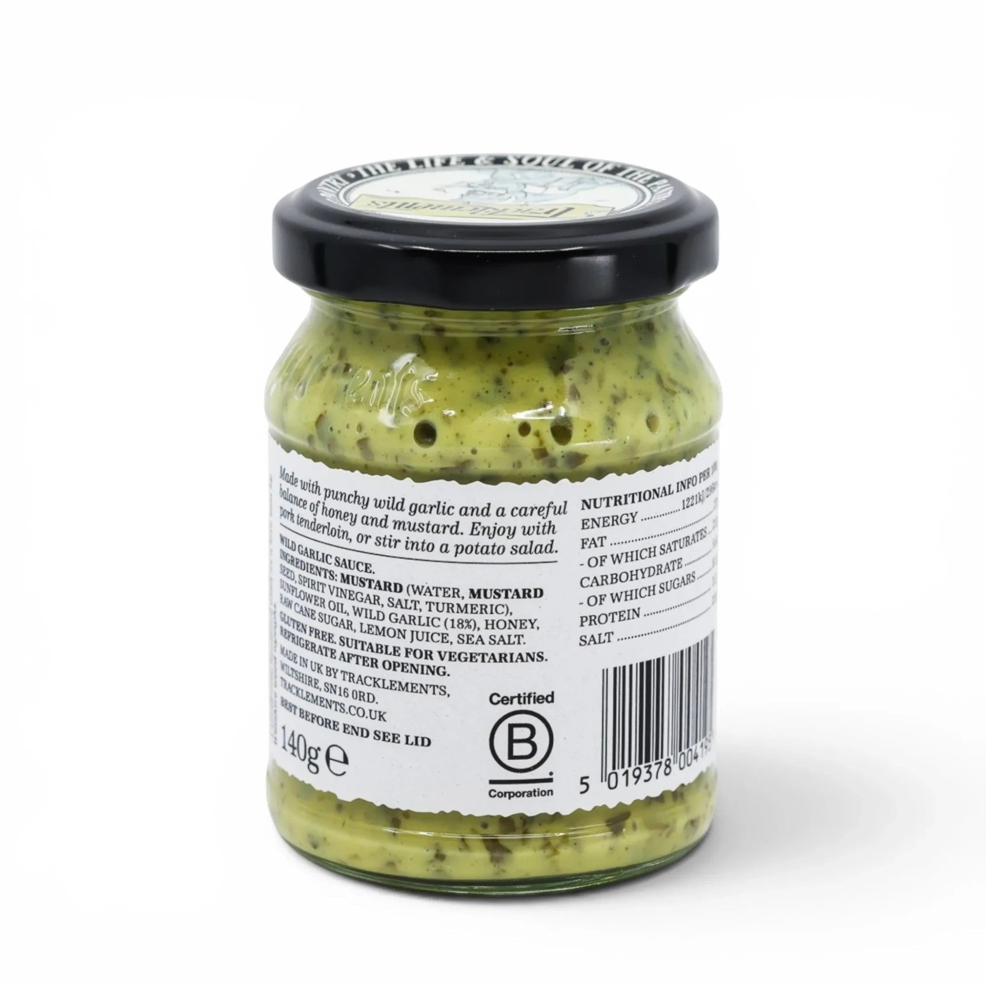 Made In England Wild Garlic Sauce in a glass jar with a black lid. The sauce is green with visible herbs and has a smooth texture.
